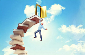 A man dangles from a stack of books with an open door at the top